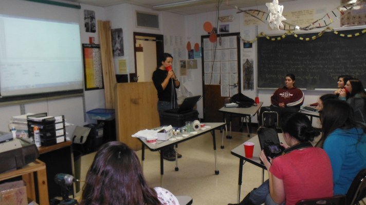 Polar researcher Elizabeth Webb demonstrates how to measure CO2 levels in human exhalation to Mr. Lane’s BFA-Anatomy and Physiology students