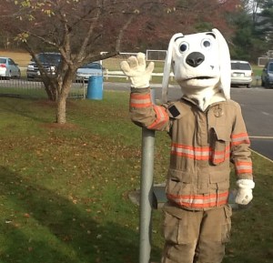 "Sparky" the Firedog greets the students with a friendly hello!  "Sparky" is a former FES student (Brendan Blair)