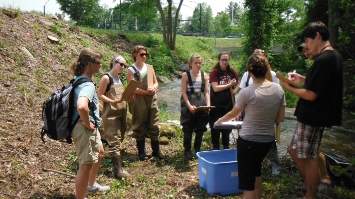 BFA Students Jordan Hoffman and Emily Pomichter work with high school teams from CVU and Long Trail School measuring water velocity as part of summer training 2013 with RACC in Shelburne, VT.