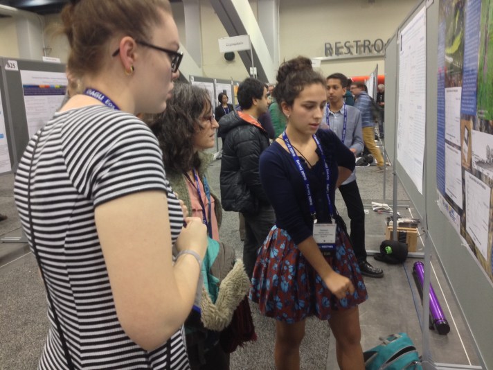 Sophie Lee  (left) and Rebekah Larose explain their research to Dr. Sue Natali, (Woods Hole Research Center) at AGU Fall Meeting, San Francisco, CA.