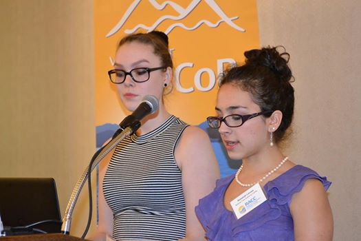 (Sophie Lee and Rebekah Larose speak at the Hilton in Burlington, VT about their research.)