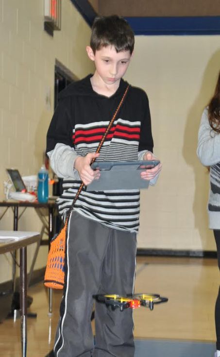 Fifth grader David Reardon flies one of the school's five drones used in fifth and sixth grade science.