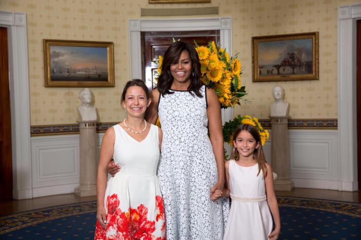 First Lady Michelle Obama greets 2016 Healthy Lunchtime Challenge winner Miranda Gallagher and mother Genevieve Gallagher from Fairfax, Vt., in the Blue Room prior to the Kids' State Dinner in the East Room of the White House, July 14, 2016. (Official White House Photo by Amanda Lucidon)This photograph is provided by THE WHITE HOUSE as a courtesy and may be printed by the subject(s) in the photograph for personal use only. The photograph may not be manipulated in any way and may not otherwise be reproduced, disseminated or broadcast, without the written permission of the White House Photo Office. This photograph may not be used in any commercial or political materials, advertisements, emails, products, promotions that in any way suggests approval or endorsement of the President, the First Family, or the White House.