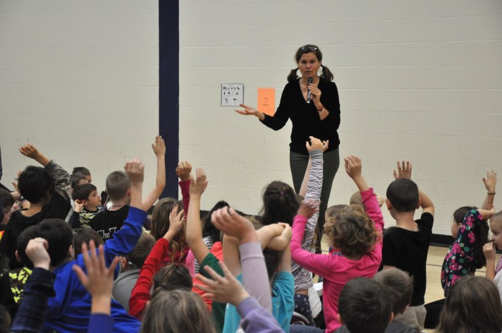 Author Jan Reynolds speaks with students at Fletcher Elementary School