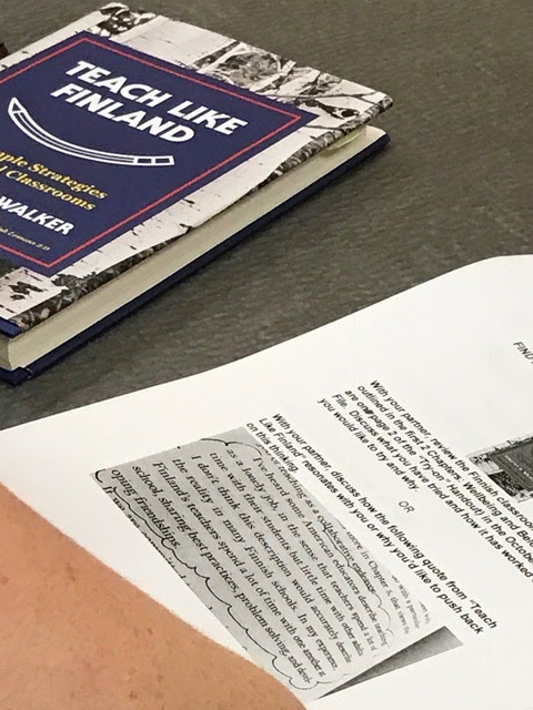 Teachers review the material for the Professional Practice Forum.