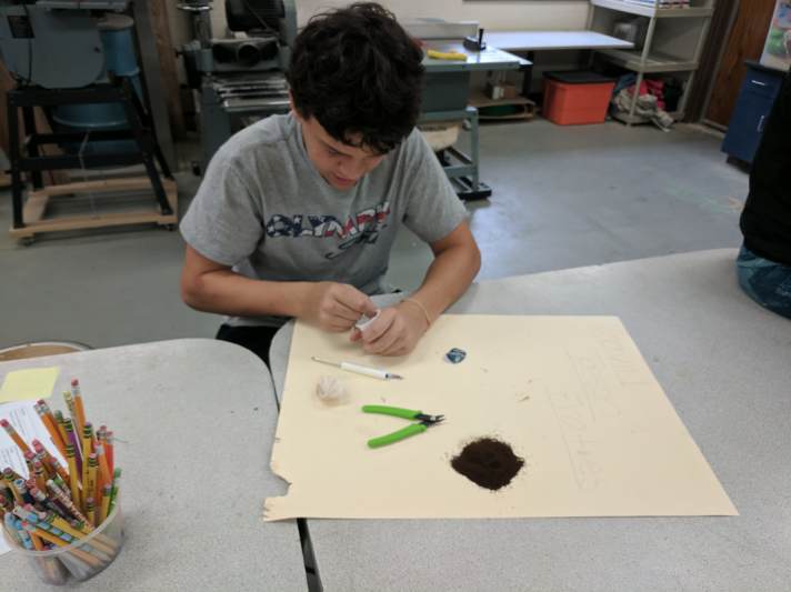 Separating a k-cup into its materials