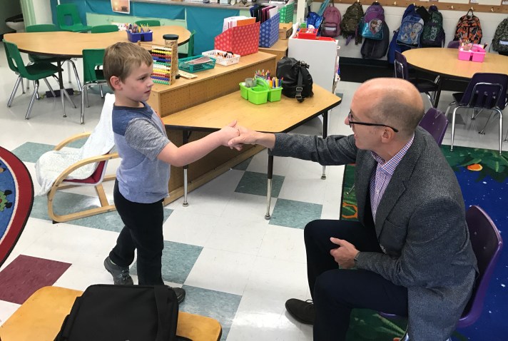 A greeting is an important part of Morning Meeting.