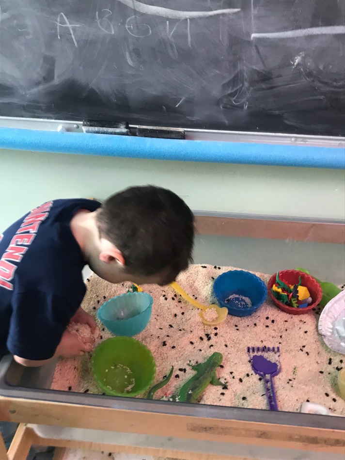 a play sandbox is a great sensory tool for some students