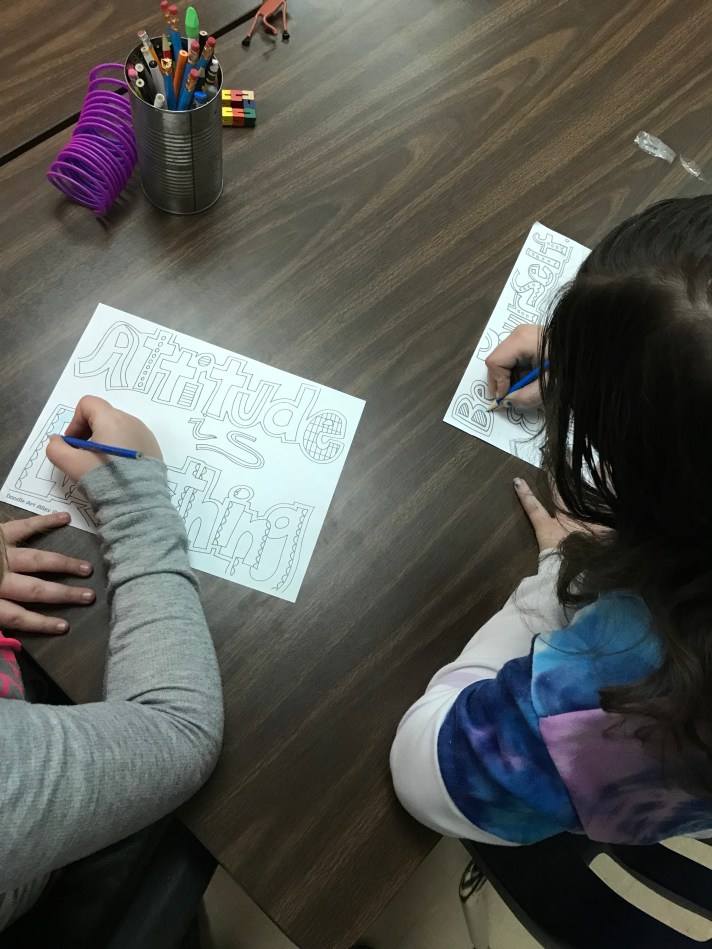 students color during a sensory break