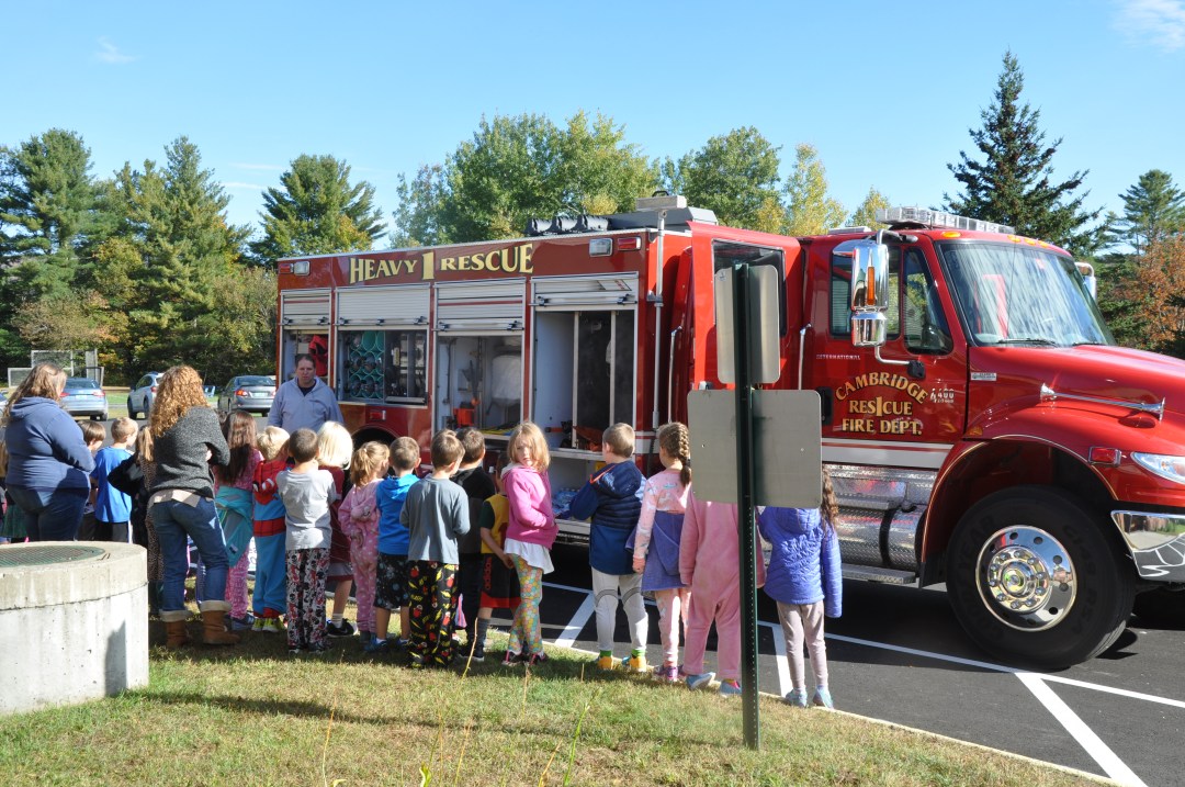 Fletcher Elementary students explore a Fire Rescue Truck during Fire Safety Month